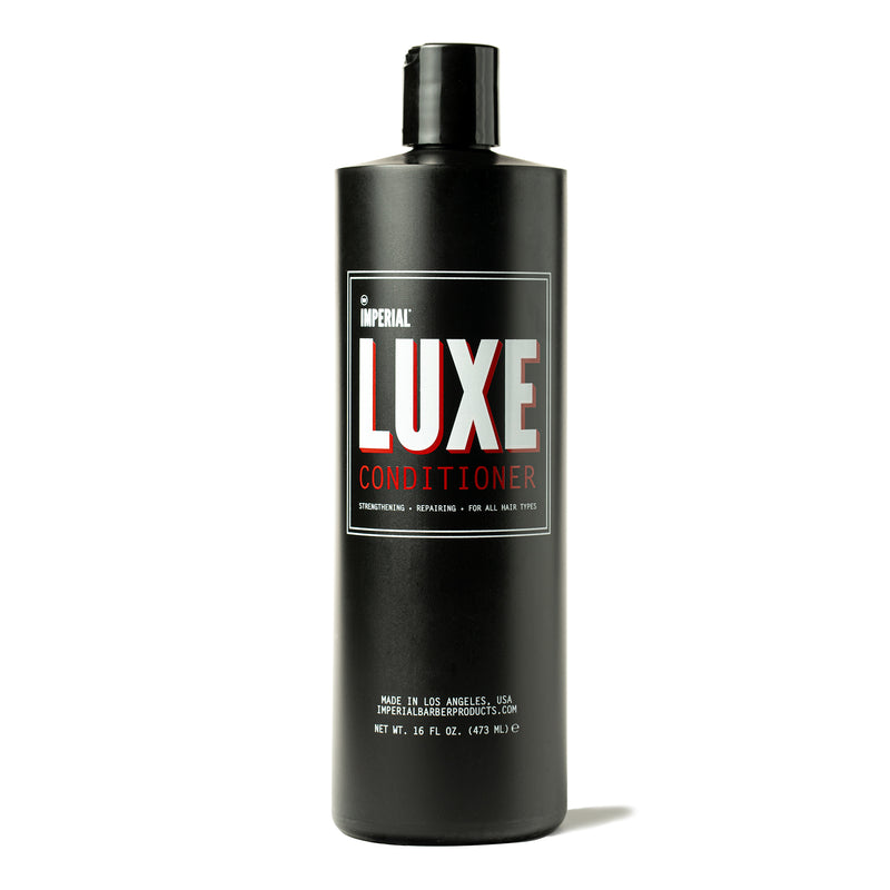 Front of a 16 oz black bottle of Imperial Luxe Conditioner, labelled strengthening, repairing, and for all hair types.
