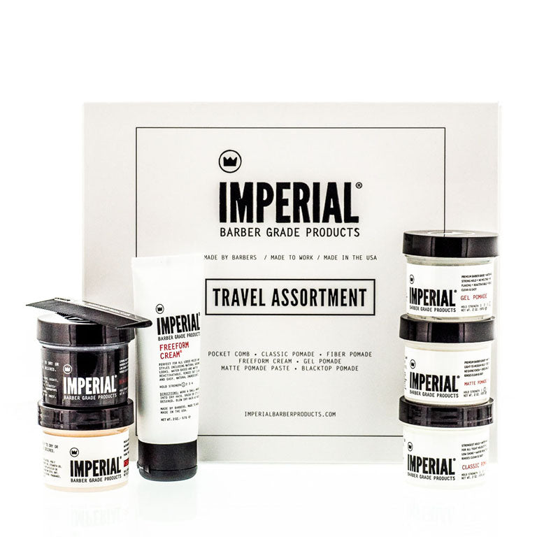 Imperial Barber Grade Products Travel Assortment kit box with six included styling products arranged in front, including Freeform Cream tube, Gel Pomade, Matte Pomade, and Classic Pomade tubs.