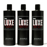 Three 16 fl oz black bottles of the Imperial Luxe Collection: Shampoo, Conditioner, and Body Wash, side by side.