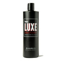 Front of a 16 oz black bottle of Imperial Luxe Conditioner, labelled strengthening, repairing, and for all hair types.