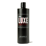 Front of a 16 oz black bottle of Imperial Luxe Conditioner, labelled strengthening, repairing, and for all hair types.