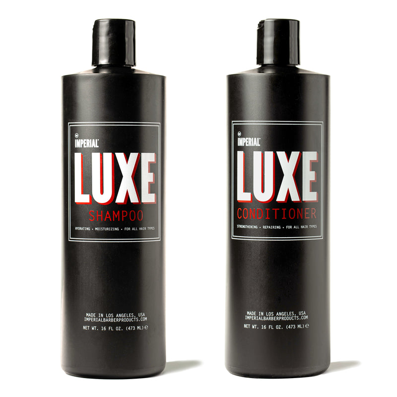Two 16 fl oz black bottles of Imperial Luxe Shampoo and Luxe Conditioner standing side by side.