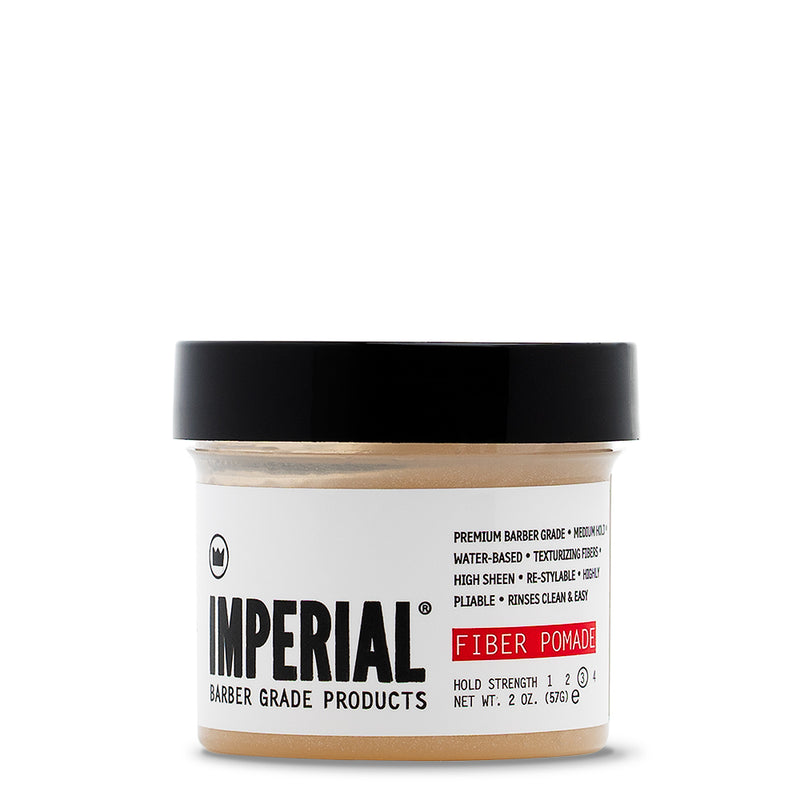 Front view of the Imperial Fiber Pomade 2 oz travel-size tub with black lid, showing medium-hold, water-based formula label.